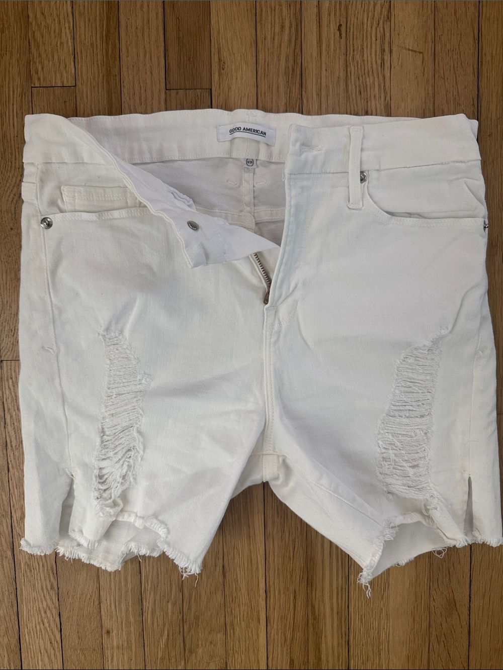Good American White Distressed Cutoff Denim Shorts